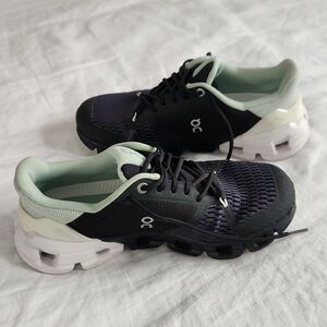 On Running Women's Black and White Running Shoes